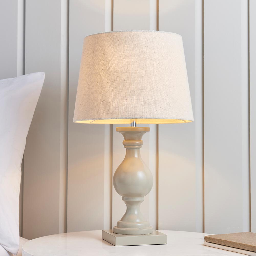 Read more about Manteo ivory fabric shade table lamp with taupe wooden base