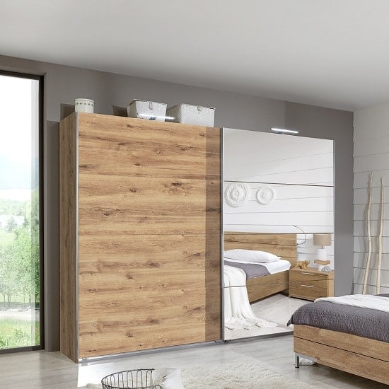 Read more about Mantova mirrored sliding wardrobe in planked oak effect