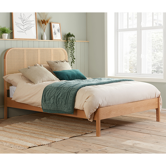 Photo of Margot wooden super king size bed in oak with rattan headboard