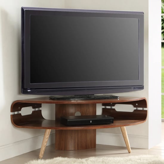 Photo of Marin corner wooden tv stand in walnut with spindle shape legs