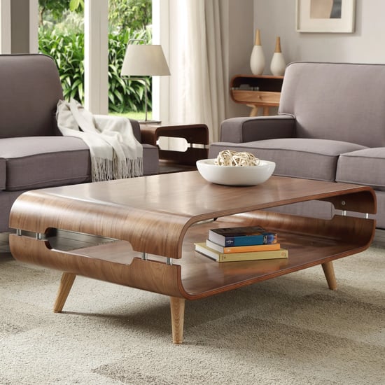 Photo of Marin wooden coffee table in walnut with spindle shape legs