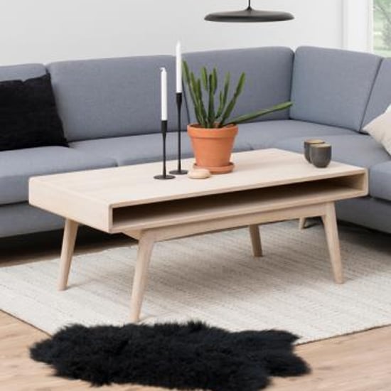 Photo of Marta wooden coffee table with 1 shelf in oak white