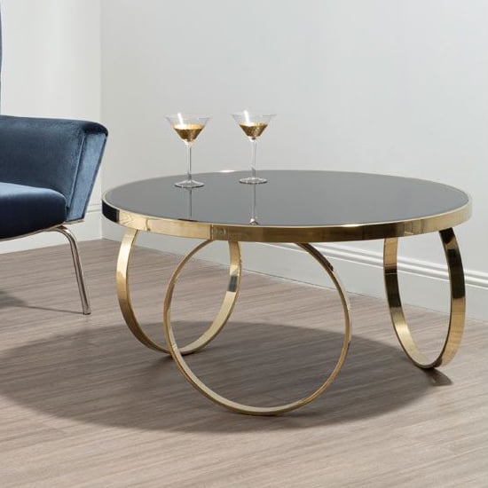 Product photograph of Meleph 100cm Round Black Glass Top Coffee Table With Gold Frame from Furniture in Fashion