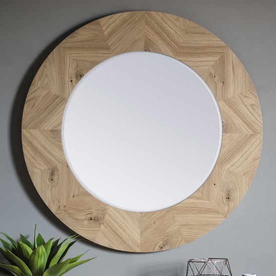 Photo of Melino round wall mirror in mat lacquer frame