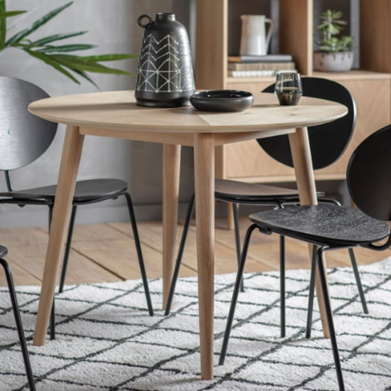 Photo of Melino round wooden dining table in mat lacquer
