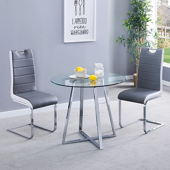 Photo of Melito round glass dining table with 2 petra grey white chairs