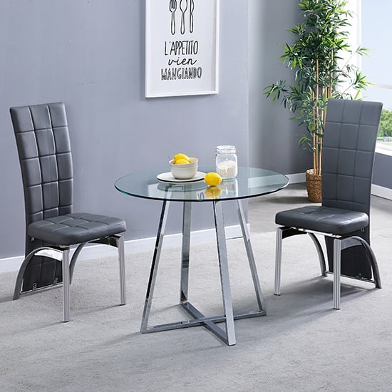 Read more about Melito round glass dining table with 2 ravenna grey chairs