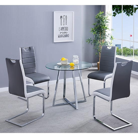 Photo of Melito round glass dining table with 4 petra grey white chairs