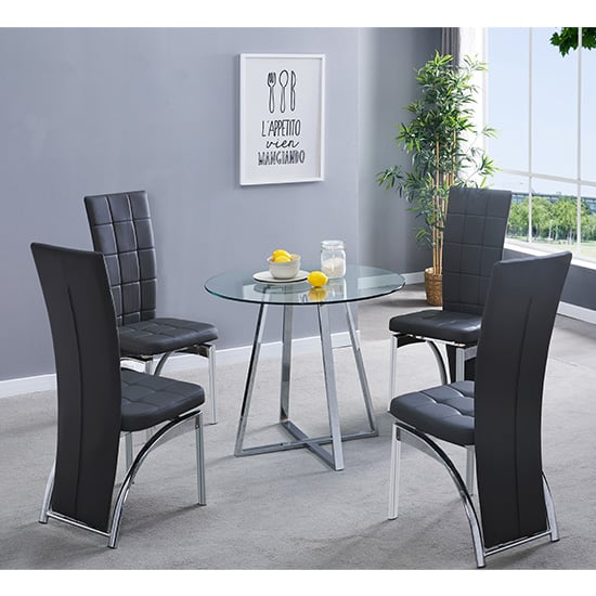 Photo of Melito round glass dining table with 4 ravenna black chairs