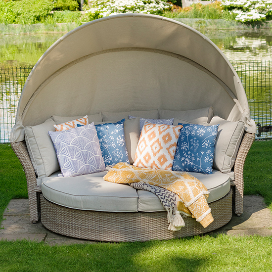 Photo of Meltan outdoor round daybed in sand