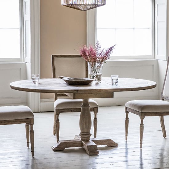 Read more about Mestiza round wooden extending dining table in natural