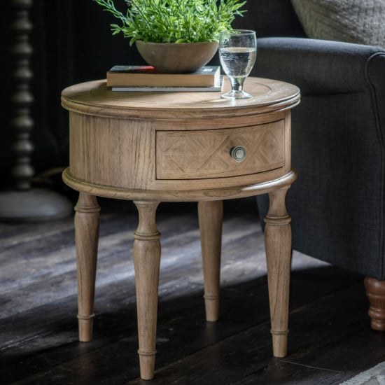 Read more about Mestiza round wooden side table with 1 drawer in natural