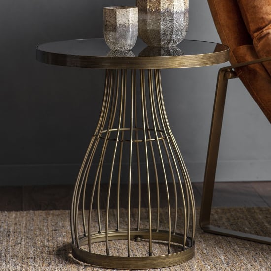 Photo of Minnesota round black glass side table with bronze frame