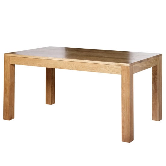 Photo of Modals wooden dining table in light solid oak