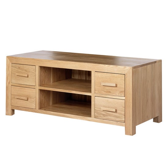 Photo of Modals wooden medium tv unit in light solid oak with 4 drawers