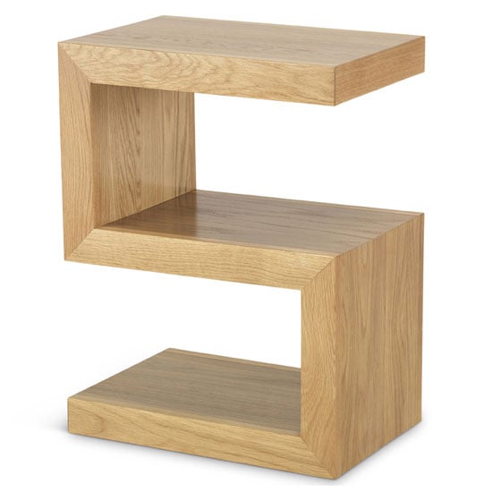 Photo of Modals wooden s shape side table in light solid oak