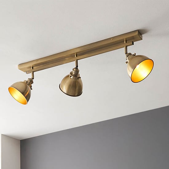 View Moline 3 lights linear bar spotlight in antique brass