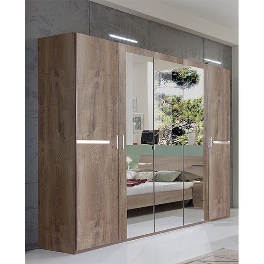 Read more about Monoceros wooden wardrobe in muddy oak with 3 mirrors