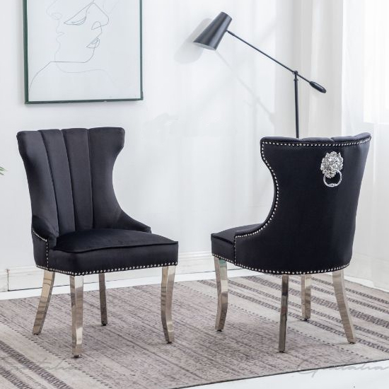 Read more about Monten lion knocker black velvet dining chairs in pair