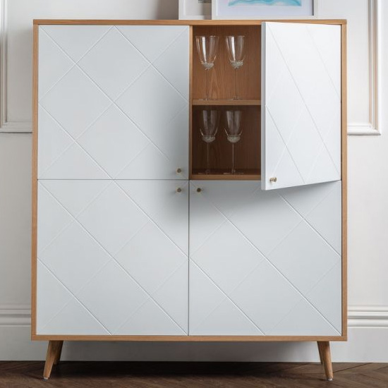 Madra Wooden Highboard In White And Oak Effect With 4 Doors