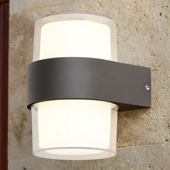 Product photograph of Naos Round Led Outdoor Up Down Wall Light In Black Clear Glass from Furniture in Fashion