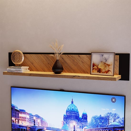 Read more about Narva wooden wall shelf in spica oak