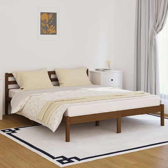 Photo of Nastia solid pinewood king size bed in honey brown