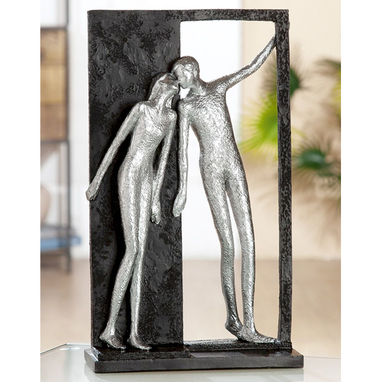 Read more about Nearby poly design sculpture in antique silver