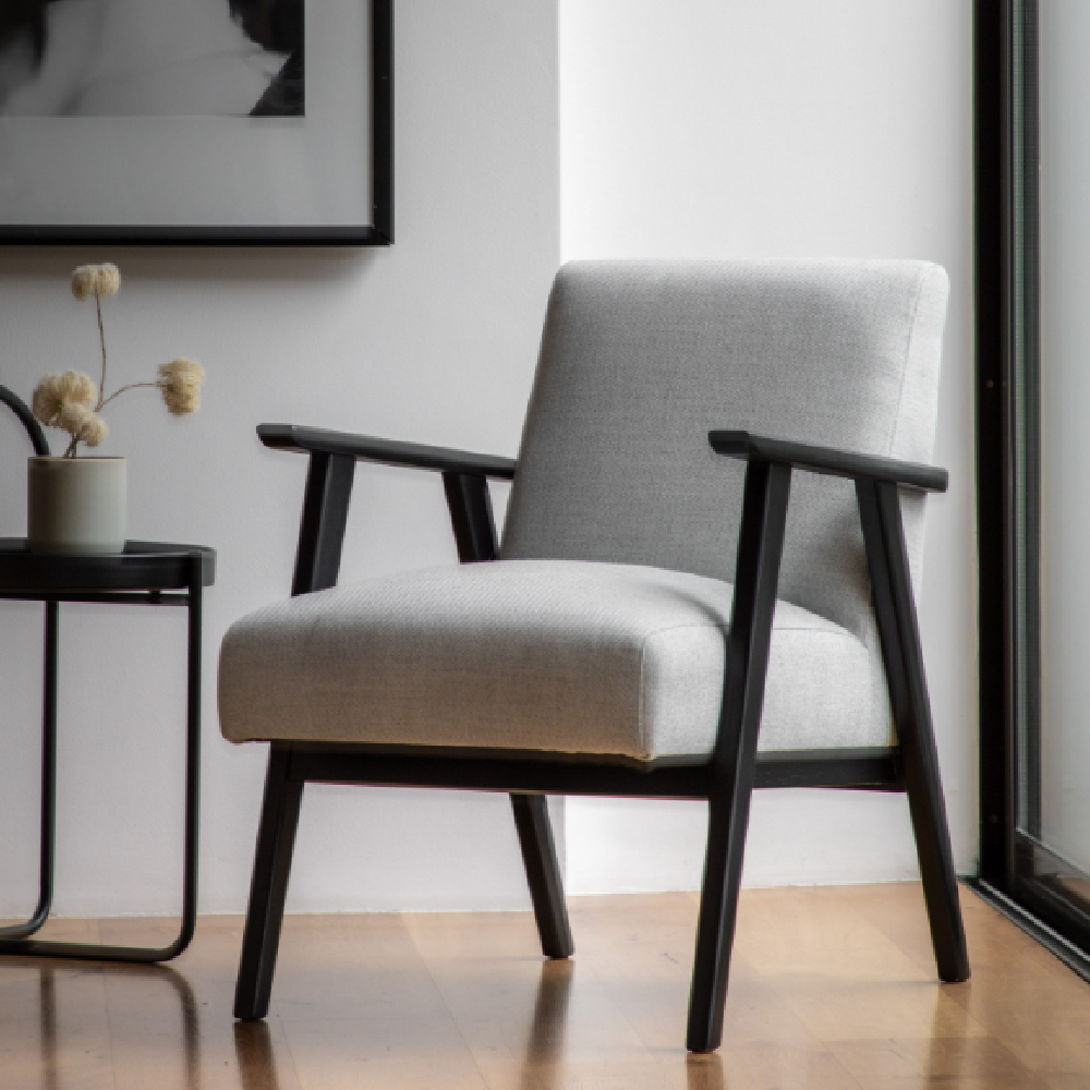 Read more about Neelan fibre armchair with wooden legs in stone