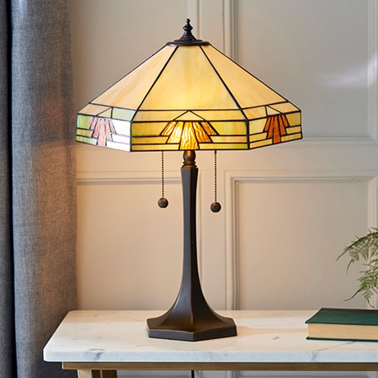 Photo of Nevada medium tiffany glass table lamp in dark bronze