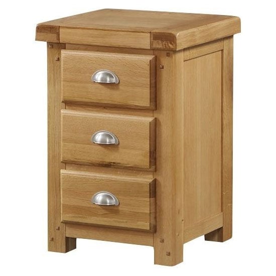 Photo of Newbridge bedside cabinet in solid wood light oak with 3 drawers