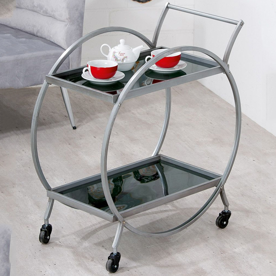Read more about Newkirk black glass serving trolley round with grey metal frame