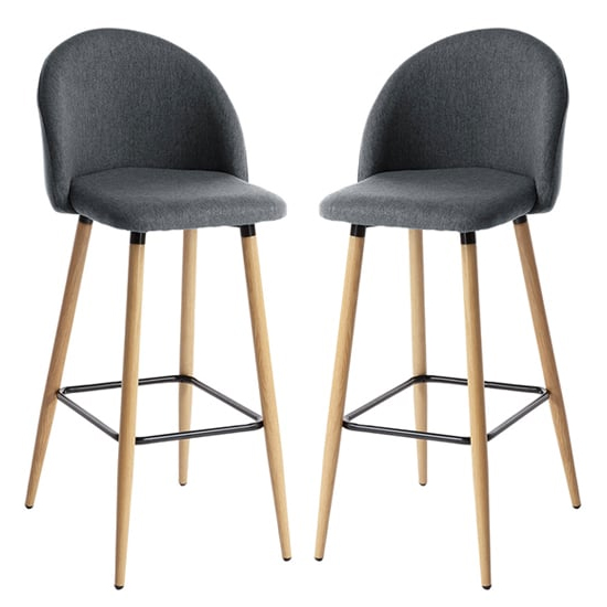 Read more about Nissan grey fabric bar stools with wooden legs in pair