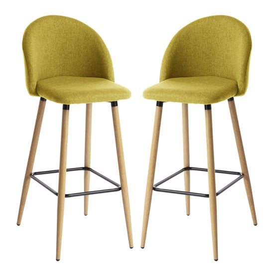 Read more about Nissan mustard fabric bar stools with wooden legs in pair