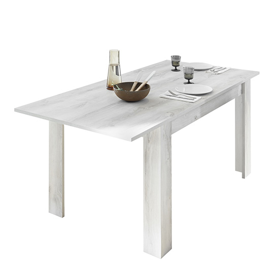 Read more about Nitro extending wooden dining table in white pine