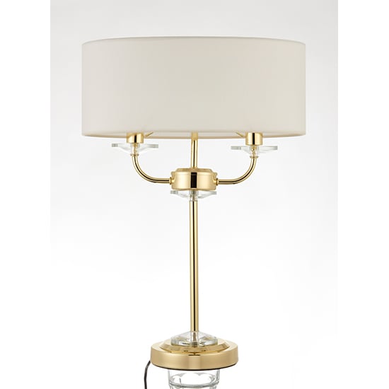 Photo of Nixon 2 lights vintage white fabric table lamp in brass