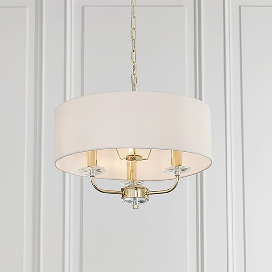 Read more about Nixon 3 lights white fabric pendant light in brass