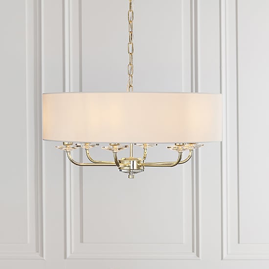 Read more about Nixon 6 lights white fabric pendant light in brass