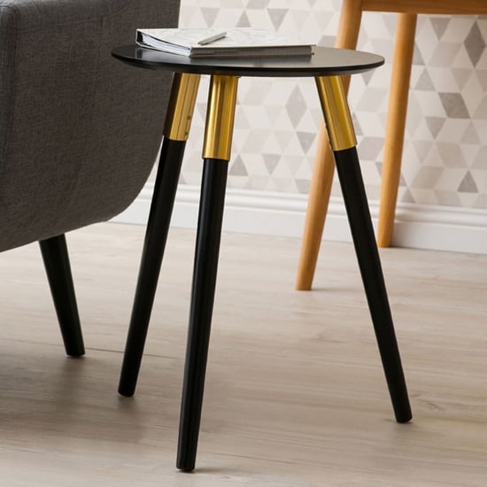 Photo of Nusakan wooden side table in black and gold