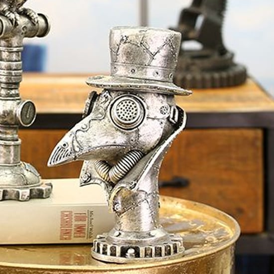 Read more about Ocala polyresin steampunk crow sculpture in silver
