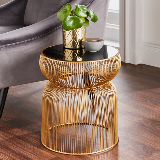 Photo of Ogden curve black glass side table with gold wire base