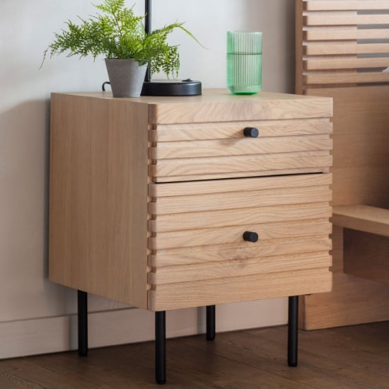 Photo of Okonma wooden bedside cabinet with metal legs in oak