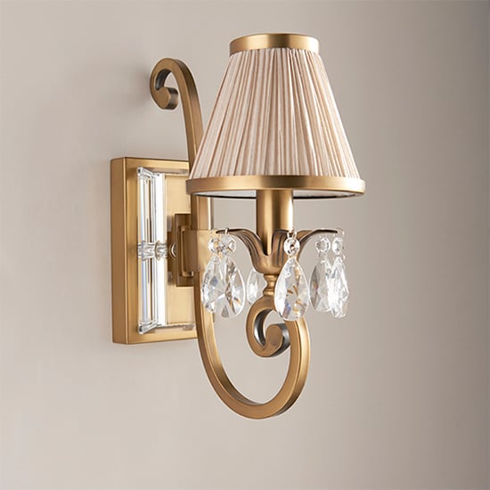 Read more about Oksana single wall light in antique brass with beige shade
