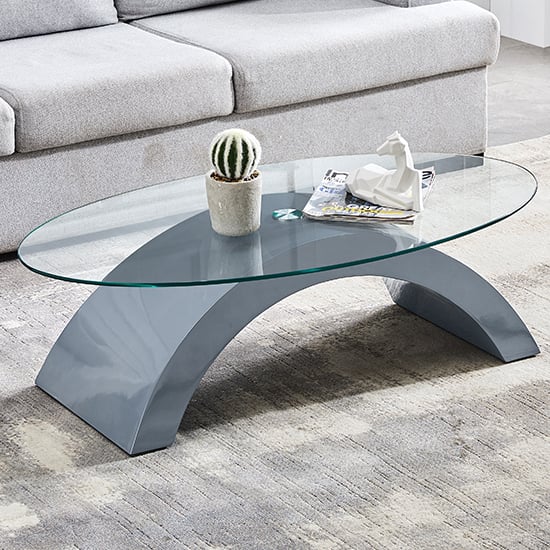 Photo of Opel oval clear glass coffee table with grey high gloss base