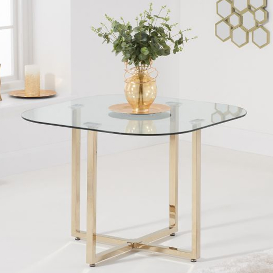 Ordell Clear Glass Dining Table With Gold Legs Furniture in Fashion