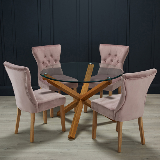 Photo of Opteron round glass dining table with 4 nipas blush chairs