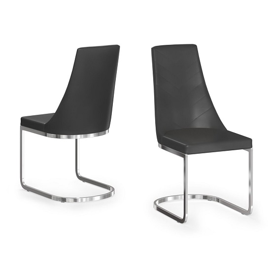 Photo of Markyate faux leather dining chair in black in a pair