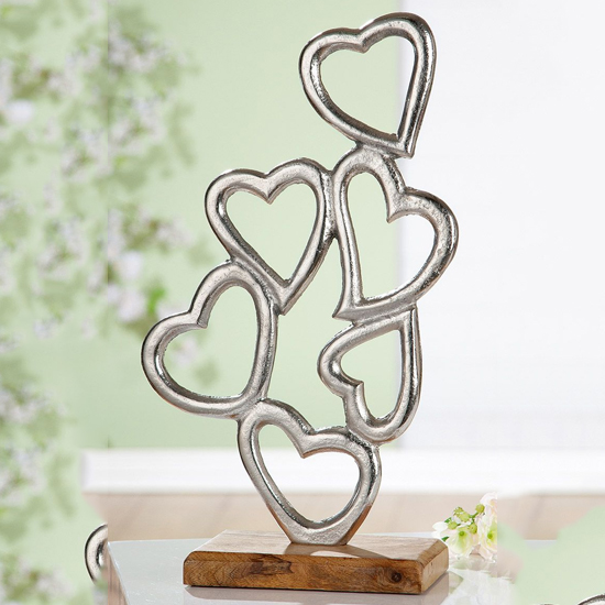 Read more about Oro aluminium hearts piled on wood base sculpture in silver