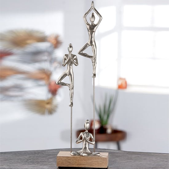 Product photograph of Oro Aluminium Yoga Group On Wood Base Sculpture In Silver from Furniture in Fashion
