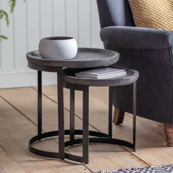 Read more about Ortica round wooden nest of 2 tables in grey wash